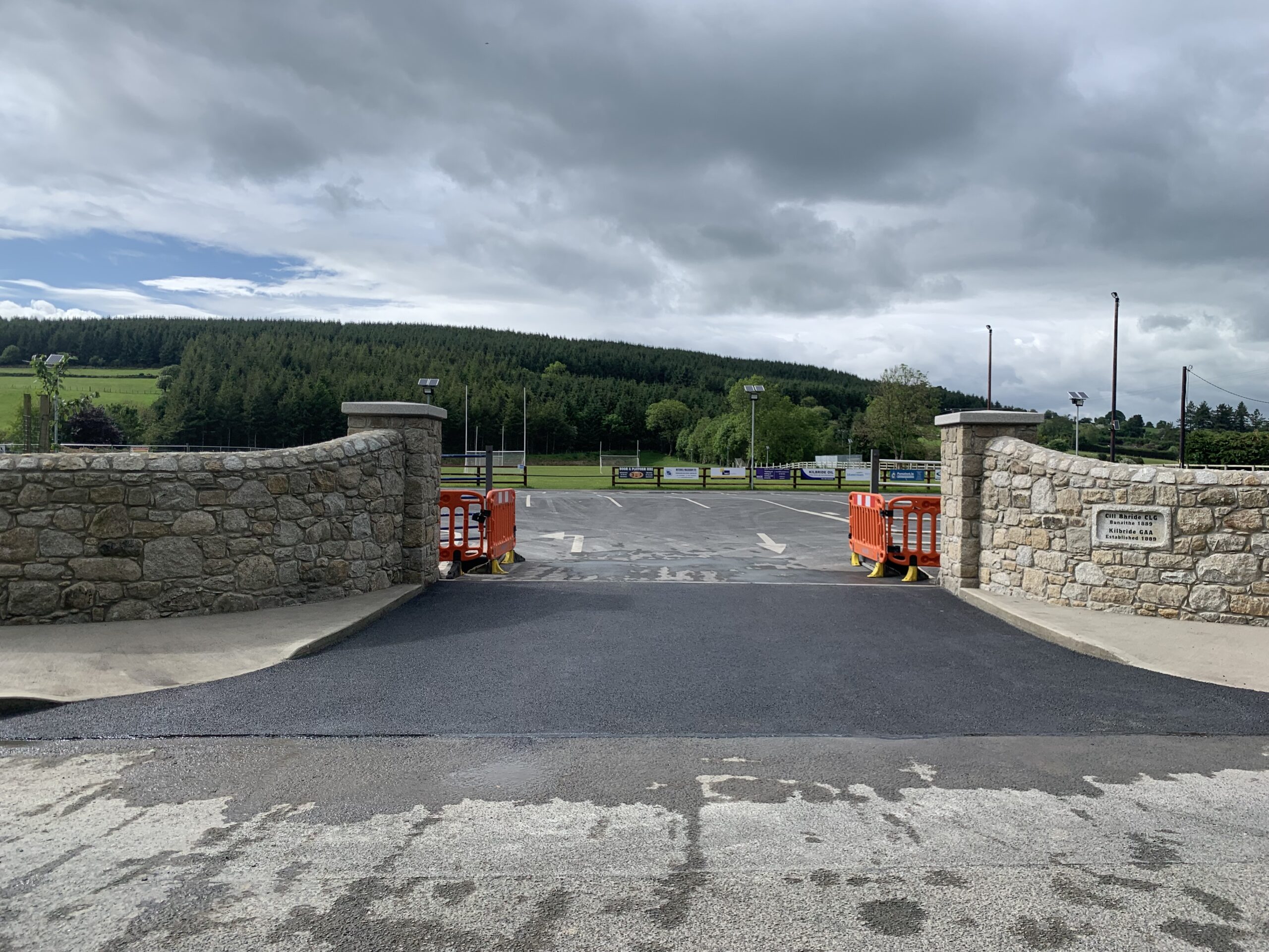 And as day follows night...the ever professional Mitchell Macadam LTD - Tarmacadam Contractors are onsite to complete the entrance.  What a job.  Awesome!